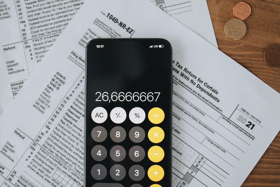 An image showing a calculator and tax forms, representing the concept of annuity taxation